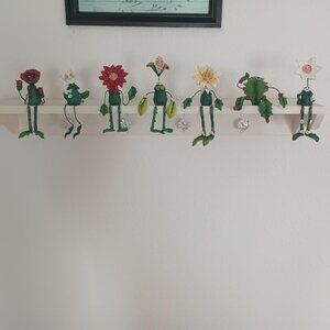 CHRISTMAS FLOWER SHELF SITTER RESIN DANGLE LEGS SET OF SEVEN NEW IN BOX